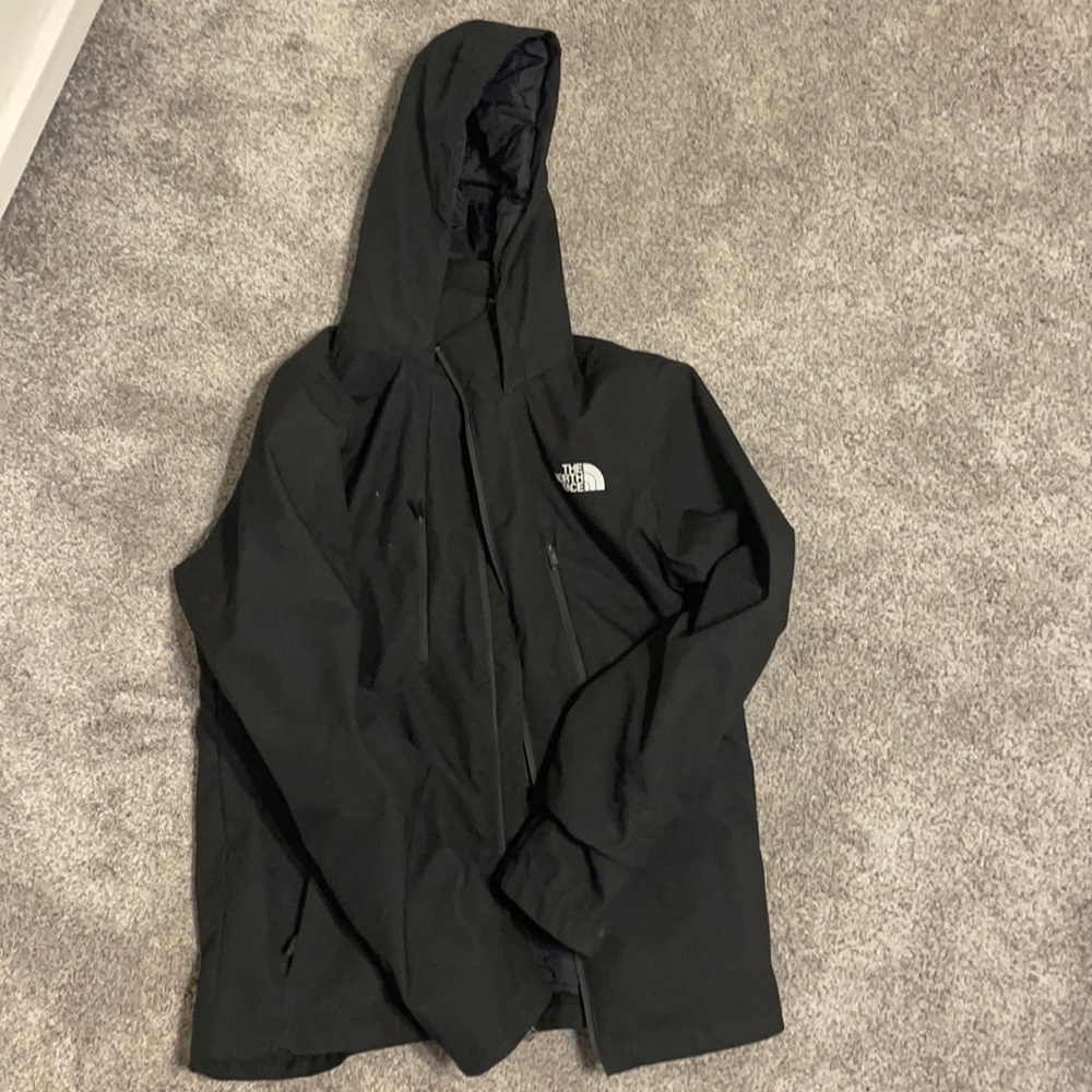This is a men’s north face double lined coat for winter.